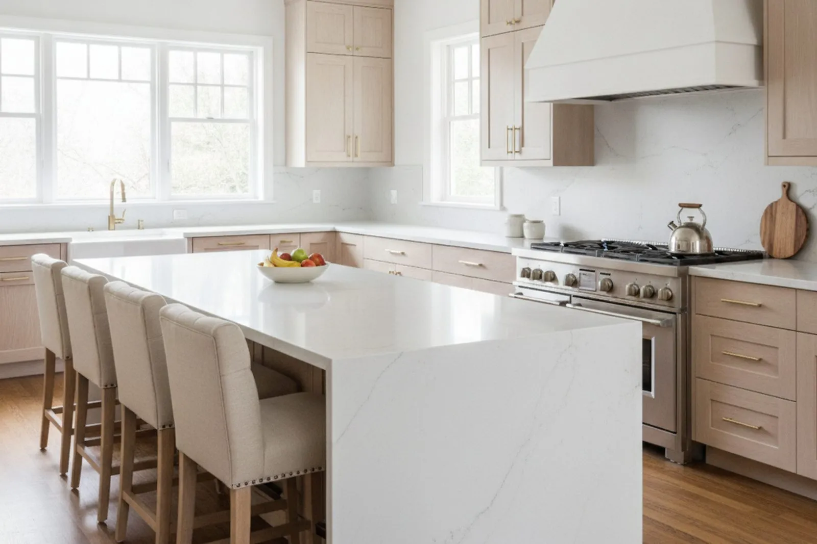 Luxury custom kitchen remodel with white oak cabinetry and a quartzite waterfall island in Wyomissing, PA